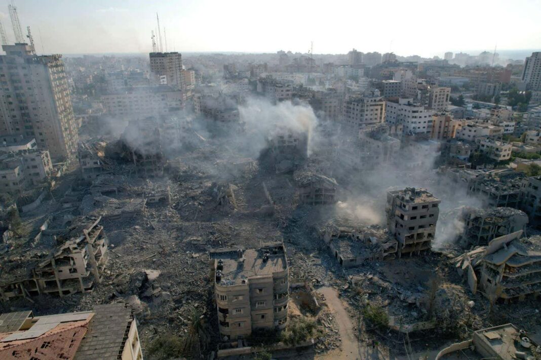 2T5NP48 GAZA CITY, PALESTINE - 10 October 2023 - Widespread damage to buildings near the Palestine Tower in Gaza City after bombardment by Isreali forces, as