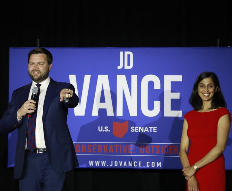 JD Vance, co-founder of Narya Capital Management LLC and U.S. Republican Senate candidate for Ohio, left, with his wife, Usha Vance on stage during a primary election night event in Cincinnati, Ohio U.S., on Tuesday, May 3, 2022. Donald Trump endorsed venture capitalist Vance in a race defined by leading candidates casting themselves as standard bearers of Trump